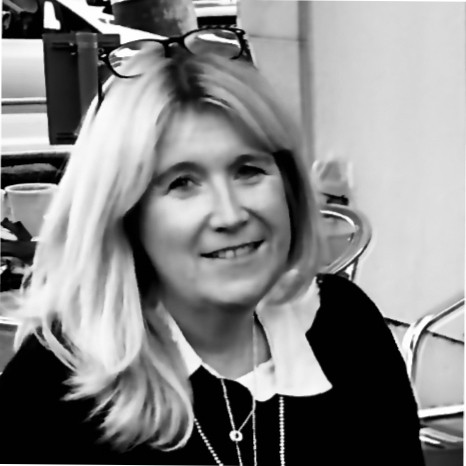A black and white photograph of Sarah Soppitt